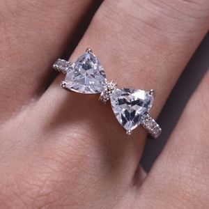 White sapphire 925 sterling silver bow ring size 7